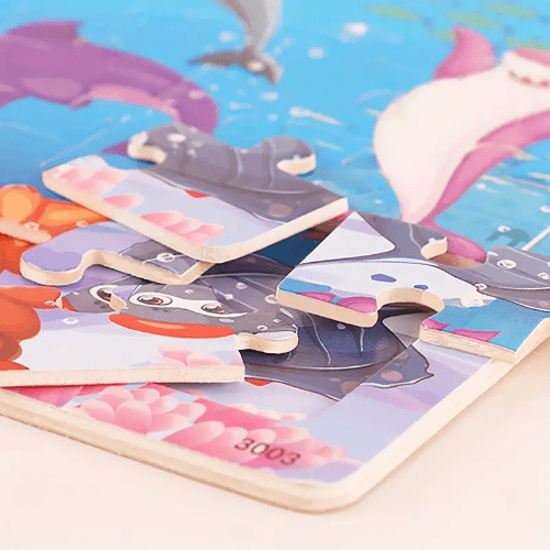 Children's puzzle with shark design on a blue background