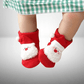 Christmas Snowman socks for babies 0–6 months. Soft, cozy, red socks with festive design — perfect for holiday wear or gifting.